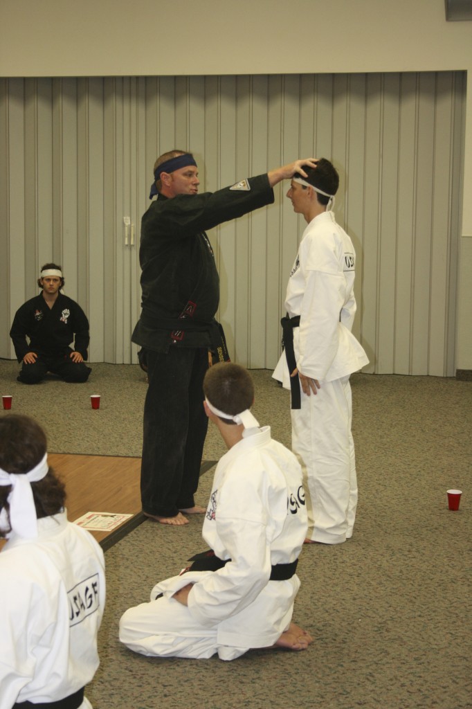 Sensei Andrew Proctor promoting his first Black Belt Eldon Taylor Shodan Ho